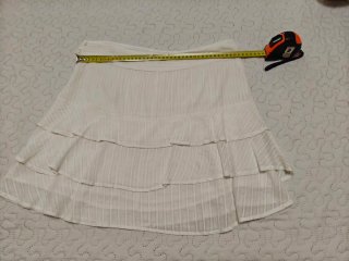 Falda blanca volantes