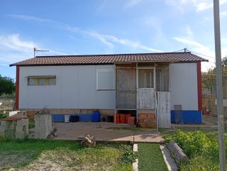 Parcela con casa prefabricadas,arboles,agua,luz y,
