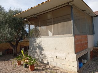 Parcela con casa prefabricadas,arboles,agua,luz y,