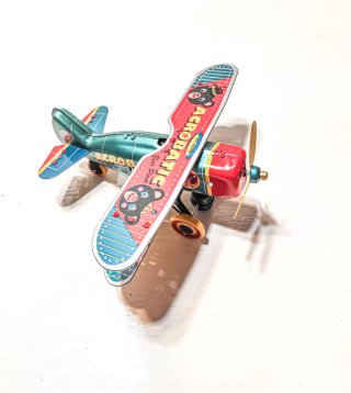 Avión Biplano Acrobático Oso Hojalata