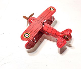 Avión Biplano de Hojalata Rojo