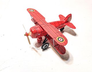 Avión Biplano de Hojalata Rojo