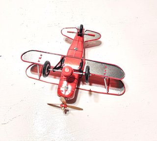 Avión Biplano de Hojalata Rojo