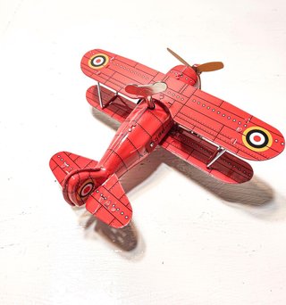 Avión Biplano de Hojalata Rojo