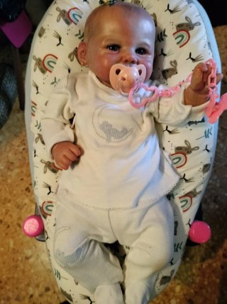 Cojín para bebé reborn con estampado