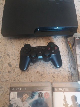 Consola Sony PS3 Negra + 6 juegos.