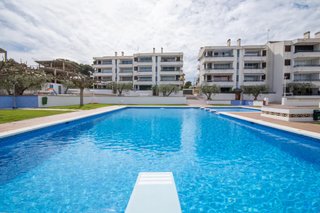 Acogedor piso vacacional con piscina comunitaria!