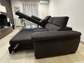 Divano con penisola contenitore e letto estraibile