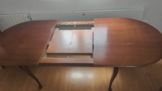 Mesa de comedor ovalada de madera maciza