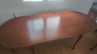 Mesa de comedor ovalada de madera maciza