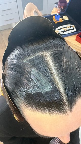 Peinado fallera y maquillaje