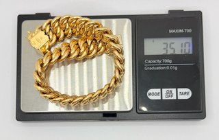 Pulsera Barbada de oro 18k, 35.1 g, 22 cm.