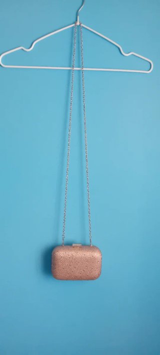 Bolso de fiesta dorado y rosa con pedrería