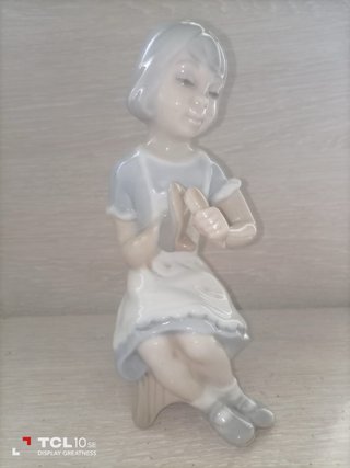 Muñeca zapatera de porcelana