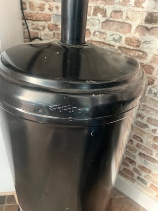 Estufa de gas negra y plateada