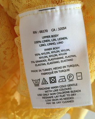 Top capa amarillo de Anthropologie talla XS