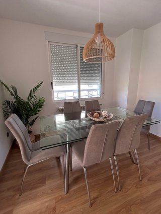 Conjunto de mesa de comedor de cristal y 6 sillas