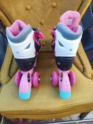 Patines en línea infantiles rosas y blancos