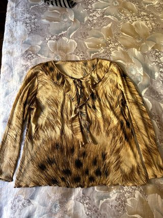 Blusa estampada manga larga