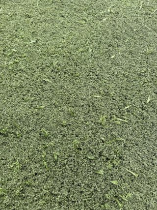 Césped artificial verde