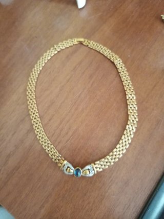 Conjunto collar y broche dorado con piedras