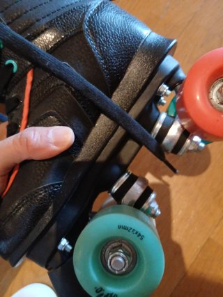 Patines Oxelo 4 Ruedas Negros Naranja