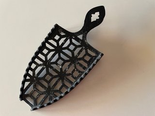 Plancha antigua de carbón con parrillas