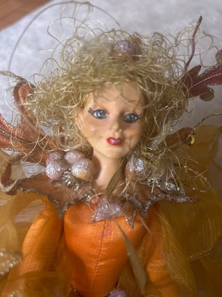 Hada de otoño de Porcelana cara y manos
