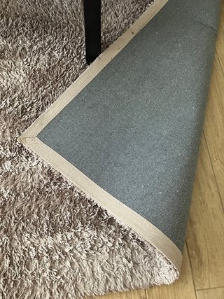 Alfombra beige y marrón de poliéster
