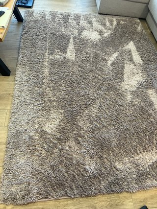 Alfombra beige y marrón de poliéster