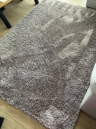 Alfombra beige y marrón de poliéster