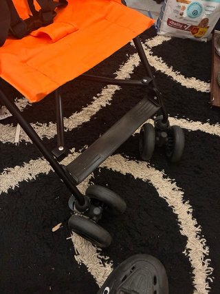 Silla de paseo naranja ligera