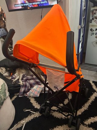 Silla de paseo naranja ligera