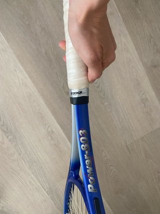 Raqueta de tenis azul