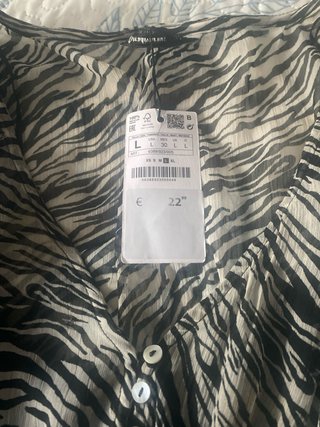 Vestido corto estampado cebra Stradivarius
