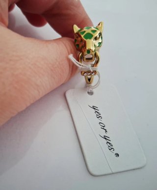 Anillo cabeza pantera acero dorado y esmalte