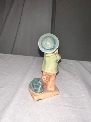 Figura niño con perro cerámica