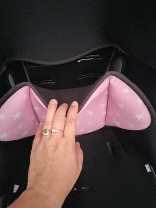 Silla de coche para bebé rosa y negra