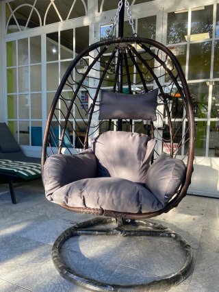 Silla columpio exterior con cojín