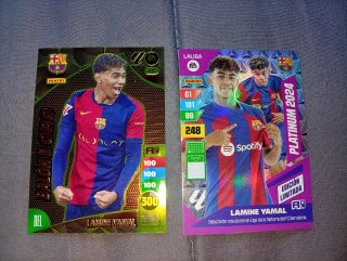 4 cromos dos de Messi y dos de lamin