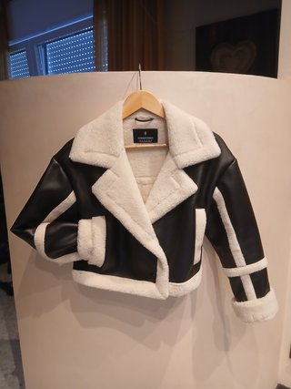 Giacca similpelle nera e bianca