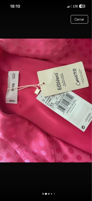 Traje chaqueta fucsia topos