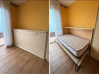Cama abatible de madera y metal.