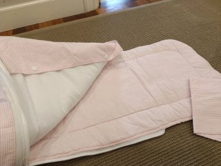 Saco capazo bebé rosa y blanco