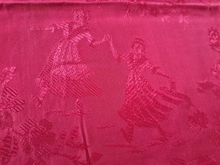 Colcha antigua roja con estampado