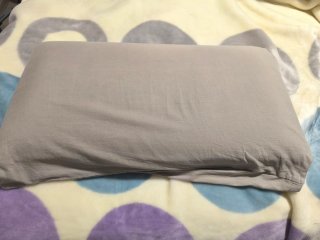 Almohada cervical gris