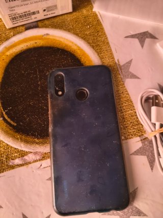 Huawei P20 lite con protector de pantalla, auricul