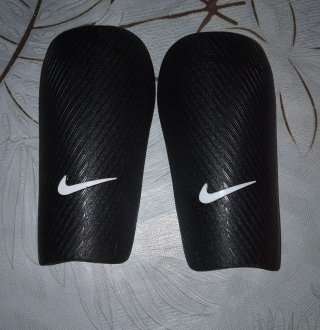 Espinilleras Nike niño