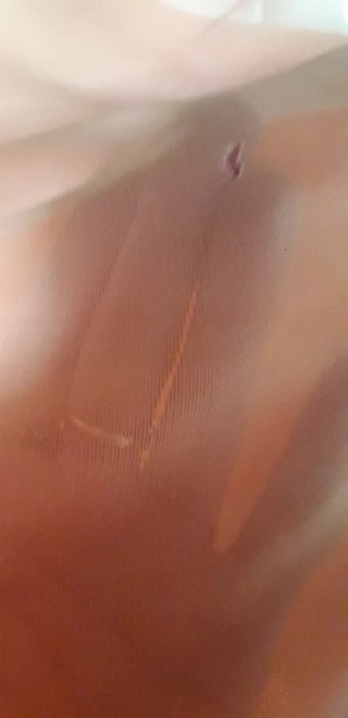 Top Bershka naranja con pedrería