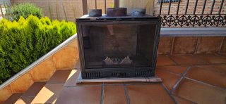 Chimenea con estufa de leña.Medidas 115x74 madera.